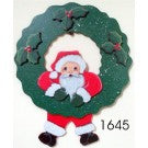 Santa Claus hanging from a wreath